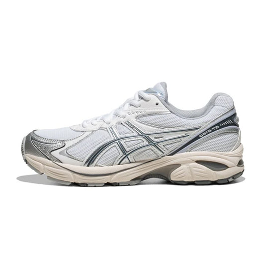 Lateral profile view of the ASICS GT-2160 White Blue Fade sneaker featuring a white mesh upper, silver and blue-fade tiger stripes, segmented white midsole, and rearfoot GEL cushioning