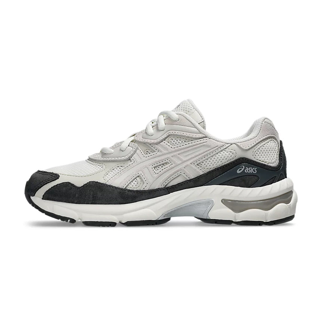 Lateral profile view of the ASICS GEL-NYC Cream Smoke Grey sneaker featuring a cream mesh upper, off-white synthetic overlays, dark smoke grey suede mudguard, cream midsole, and visible GEL pods.