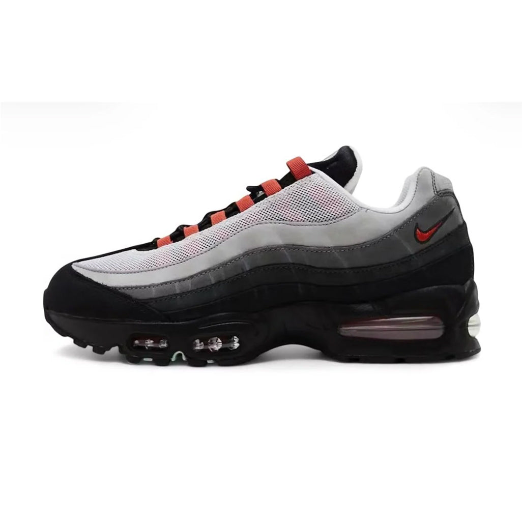 Lateral profile view of the Nike Air Max 95 Big Bubble Liverpool JD Sports Exclusive sneaker featuring a black midsole, graduated grey-to-black side panels, red lace loops, and a red heel Swoosh.