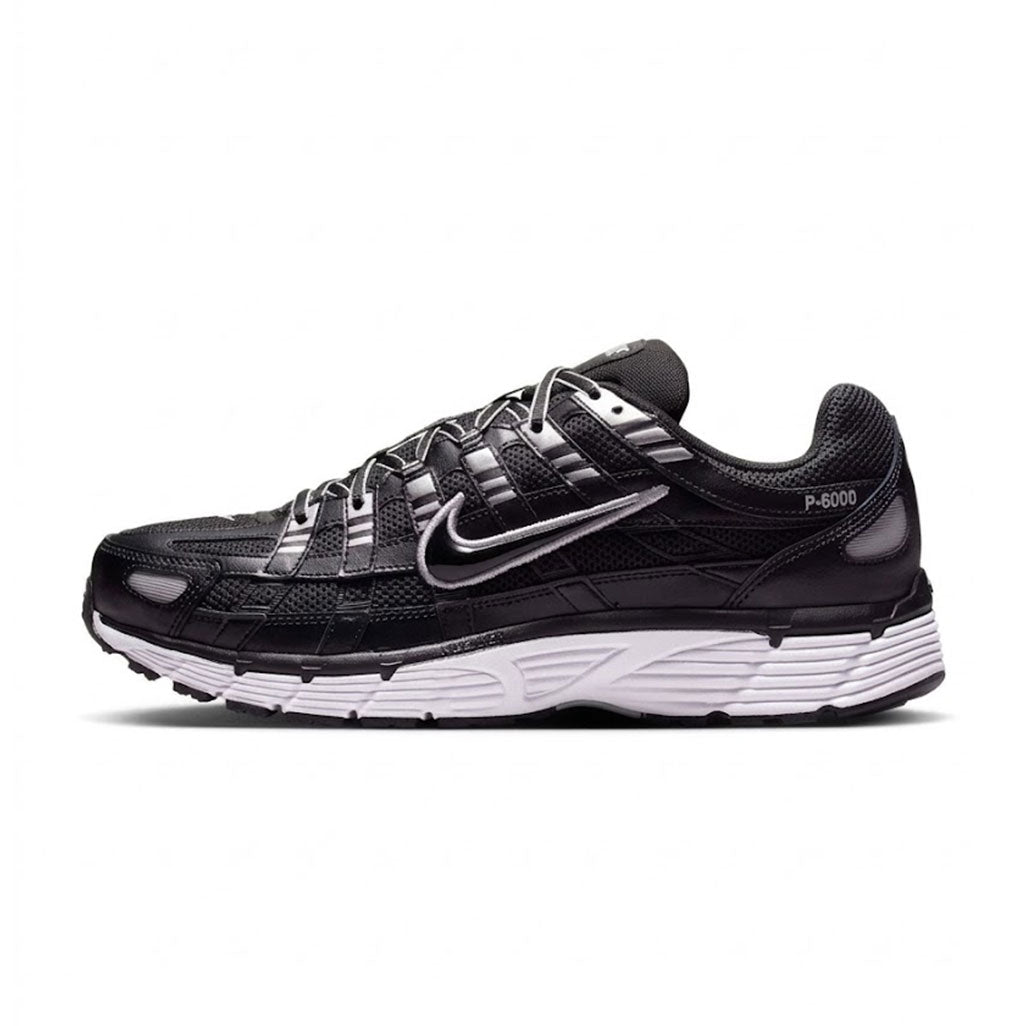 Lateral profile view of the Nike P-6000 Black White Metallic Silver sneaker showcasing a black mesh upper with metallic silver overlays, silver Swoosh outline, white foam midsole, and black rubber outsole.