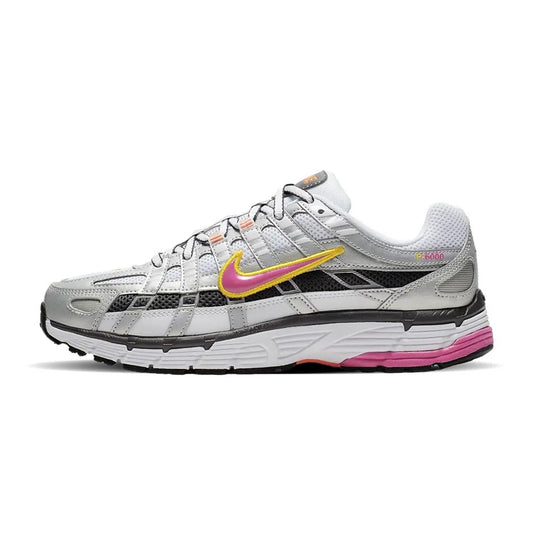 Lateral profile view of the Nike P-6000 Laser Fuchsia sneaker featuring a silver mesh upper, metallic silver and black overlays, laser fuchsia Swoosh outlined in yellow, and a white foam midsole with fuchsia tread accents.