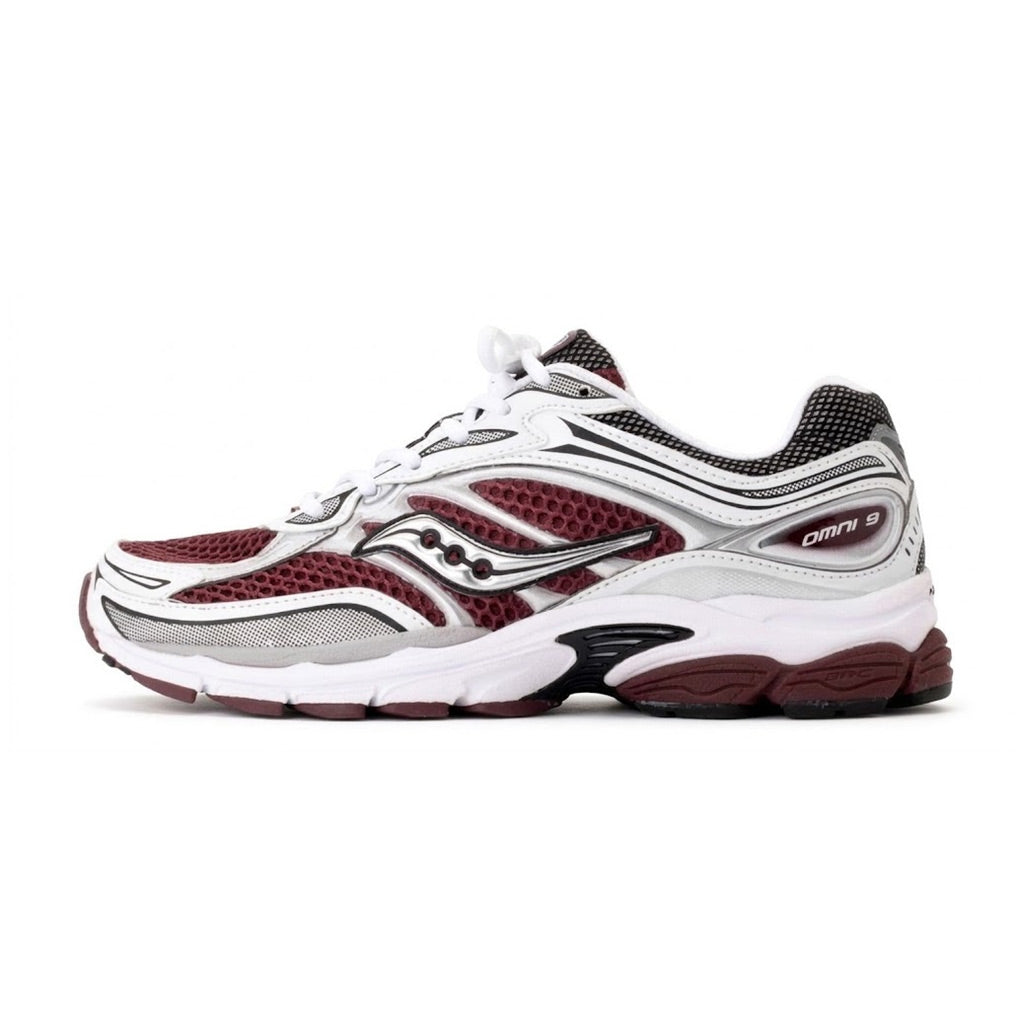 Lateral profile view of the Saucony ProGrid Omni 9 Maroon White sneaker featuring a maroon mesh upper, white and metallic silver structural overlays, silver Saucony creek logo, white foam midsole, and maroon rubber outsole.